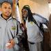 Michigan wide receiver Roy Roundtree and senior quarterback Denard Robinson stand near a roller coaster during a team outing at Busch Gardens in Tampa, Fla. on Saturday, Dec. 29. Melanie Maxwell I AnnArbor.com